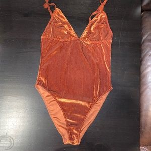 XS urban outfitters onesie